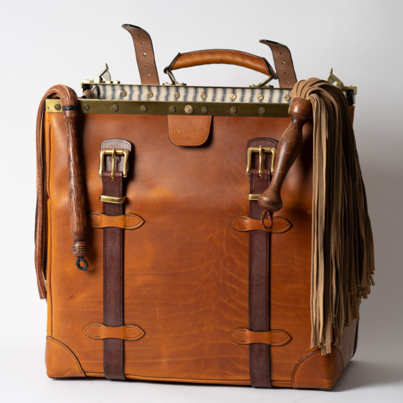 Bspoke work for a client who wanted a Gladstone Bag to carry his BDSM equipment and toys in style